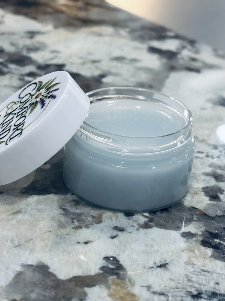Open jar from a blue Renew Cleansing Balm test batch